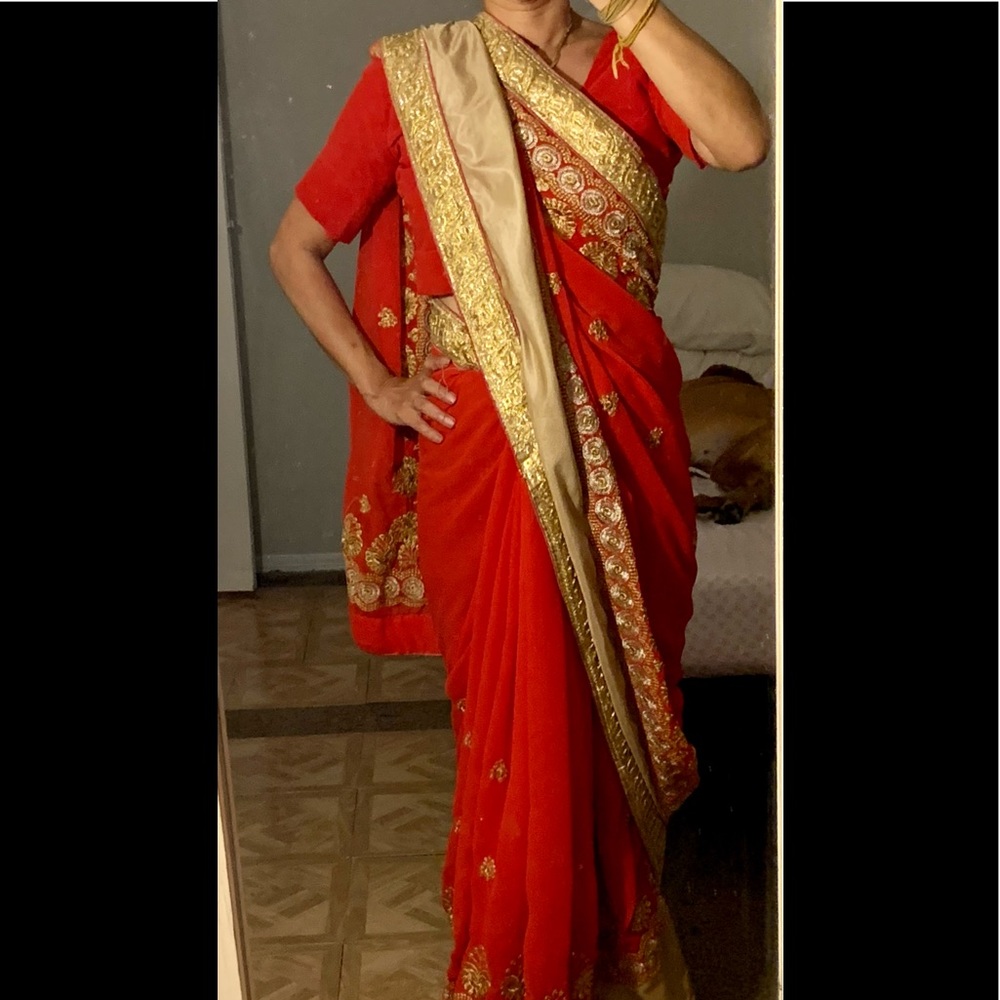 Red and gold saree